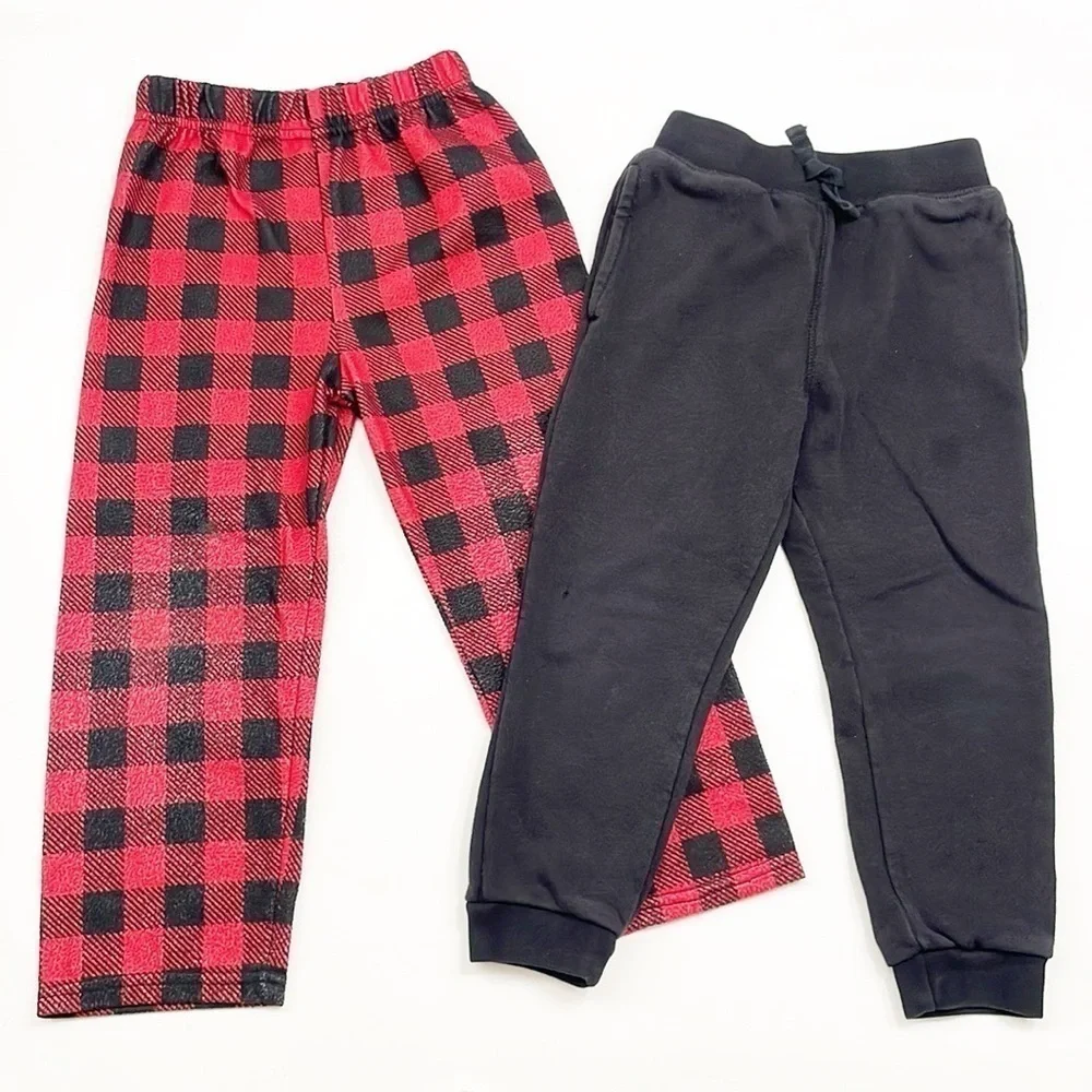 PJ's & Presents plaid fleece pj bottoms + The Children's Place black sweatpants
